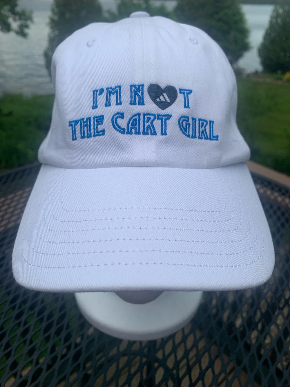 White women’s Golf Hat with Blue 'I'm Not The Cart Girl' Embroidery. NWT